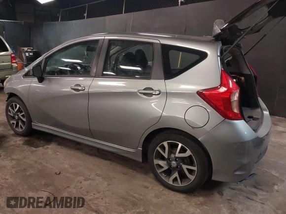 2015 Nissan Note SV with VIN 3N1CE2CP0FL400447, listed as a IAAI auction lot 41669498 with 96,699 mi miles and . Bid and sale history available at DreamBid. Image 3.