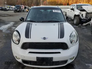 2012 MINI Countryman S с VIN WMWZC5C53CWL55584, выставлен на аукционе Copart как лот 86159574 с пробегом 117 504 миль миль и Списание • Salvage title. История ставок и продаж доступна на DreamBid. Изображение 5.