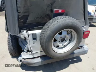 2004 Jeep Wrangler SE with VIN 1J4FA29134P715165, listed as a IAAI auction lot 42297821 with 109,397 mi miles and . Bid and sale history available at DreamBid. Image 6.
