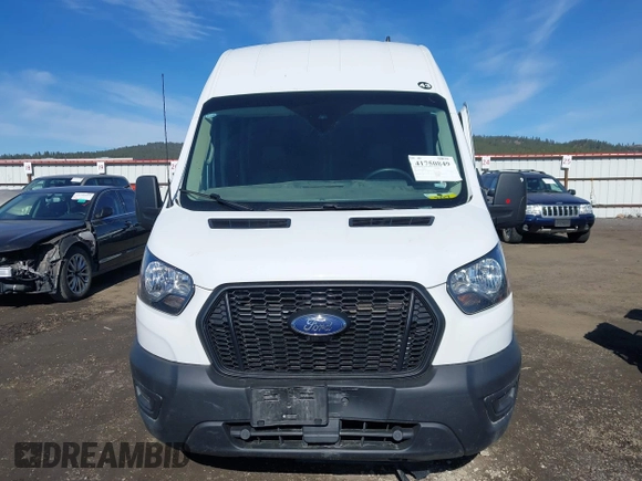 2023 Ford Transit Cargo with VIN 1FTBR2X84PKB37947, listed as a IAAI auction lot 41750849 with 58,114 mi miles and . Bid and sale history available at DreamBid. Image 12.