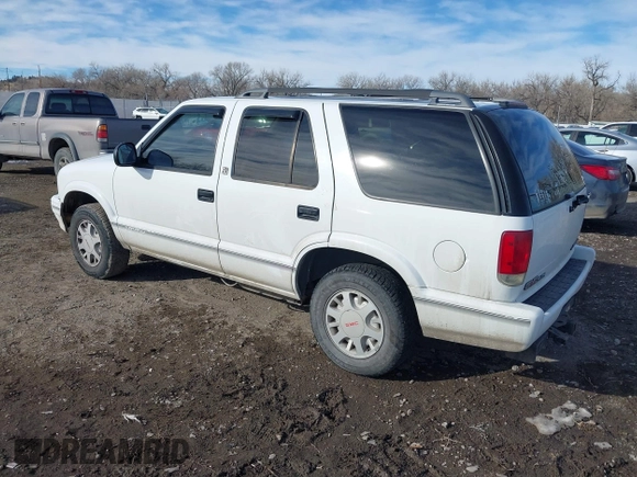 1996 GMC Jimmy SL z VIN 1GKDT13W8T2522192, wystawiony jako IAAI lot #41439548 z przebiegiem 262 152 mil mil oraz . Historia ofert i sprzedaży dostępna na DreamBid. Obrazek 3.