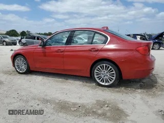 2014 BMW 3 Series 328i xDrive with VIN WBA3B3C59EJ977670, listed as a Copart auction lot 55281475 with 128,937 mi miles and Salvage Title. Bid and sale history available at carsss.com. Image 2.