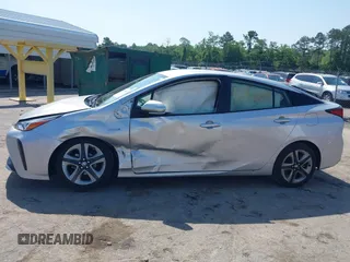 2021 Toyota Prius L Eco z VIN JTDKAMFU5M3137298, wystawiony jako IAAI lot #42270937 z przebiegiem 38 828 mil mil oraz . Historia ofert i sprzedaży dostępna na DreamBid. Obrazek 13.