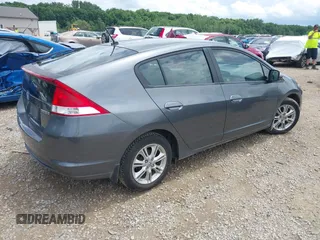 2010 Honda Insight EX with VIN JHMZE2H71AS008487, listed as a IAAI auction lot 42533409 with 95,765 mi miles and . Bid and sale history available at DreamBid. Image 4.