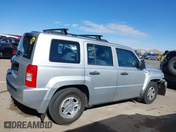 2010 Jeep Patriot Sport with VIN 1J4NT2GB1AD519675, listed as a IAAI auction lot 41321426 with 239,093 mi miles. Bid and sale history available at carsss.com. Image 13.