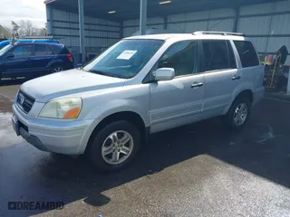 2003 Honda Pilot EX with VIN 2HKYF18613H539217, listed as a IAAI auction lot 41696214 with 329,118 mi miles. Bid and sale history available at carsss.com. Image 2.