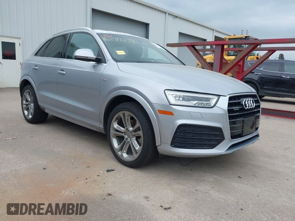 2018 Audi Q3 Premium Plus z VIN WA1JCCFS8JR023281, wystawiony jako IAAI lot #42071289 z przebiegiem 71 335 mil mil oraz . Historia ofert i sprzedaży dostępna na DreamBid. Obrazek 1.