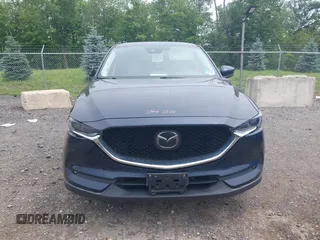 2018 Mazda CX-5 Grand Touring with VIN JM3KFBDMXJ0361812, listed as a IAAI auction lot 42509752 with 131,386 mi miles and . Bid and sale history available at DreamBid. Image 13.