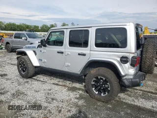2024 Jeep Wrangler Rubicon with VIN 1C4RJXR6XRW292478, listed as a Copart auction lot 55655575 with 11,122 mi miles and Salvage Title. Bid and sale history available at carsss.com. Image 3.