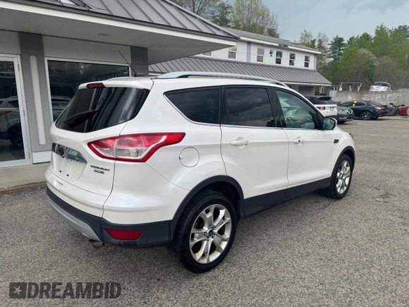 2014 Ford Escape Titanium with VIN 1FMCU9J94EUC63638, listed as a Copart auction lot 55880505 with 198,112 mi miles and Clean Title. Bid and sale history available at DreamBid. Image 4.