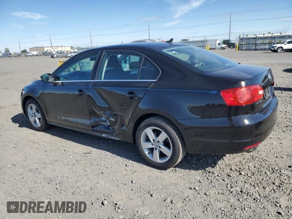 2011 Volkswagen Jetta TDI w/Nav with VIN 3VWLL7AJ3BM081805, listed as a Copart auction lot 62791495 with 115,352 mi miles and Salvage title. Bid and sale history available at DreamBid. Image 2.