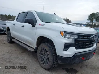 2023 Chevrolet Silverado 1500 LT Trail Boss with VIN 3GCUDFE82PG145067, listed as a IAAI auction lot 41380162 with 34,623 mi miles and . Bid and sale history available at DreamBid. Image 1.