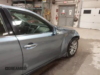 2015 Infiniti Q50 Premium with VIN JN1BV7AR2FM414613, listed as a IAAI auction lot 41258797 with 162,822 mi miles. Bid and sale history available at carsss.com. Image 18.