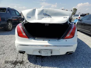 2015 Jaguar XJ with VIN SAJWA1CZ8F8V81637, listed as a Copart auction lot 55619555 with 88,328 mi miles and Salvage Title. Bid and sale history available at DreamBid. Image 6.