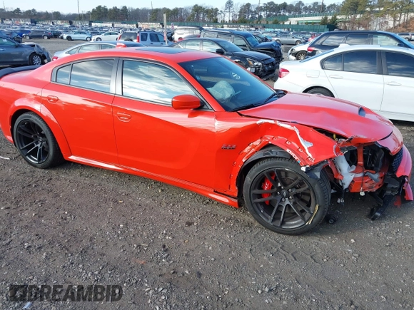 2022 Dodge Charger Scat Pack Widebody with VIN 2C3CDXGJ3NH101081, listed as a IAAI auction lot 41351466 with 9,575 mi miles and . Bid and sale history available at DreamBid. Image 1.
