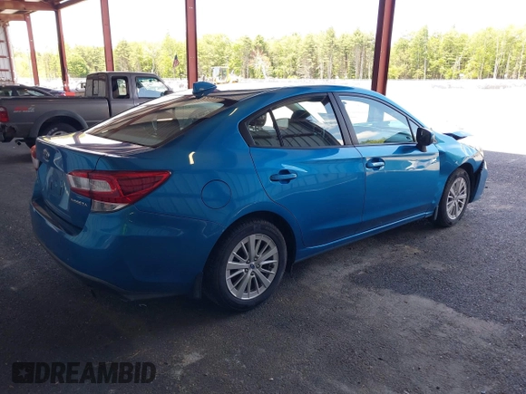 2018 Subaru Impreza Premium with VIN 4S3GKAB62J3611731, listed as a IAAI auction lot 42400939 with 105,665 mi miles and . Bid and sale history available at DreamBid. Image 4.