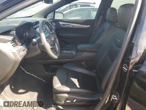2022 Cadillac XT5 FWD Luxury z VIN 1GYKNAR4XNZ165234, wystawiony jako Copart lot #85392754 z przebiegiem 36 100 mil mil oraz Nie do naprawy • Non repairable. Historia ofert i sprzedaży dostępna na DreamBid. Obrazek 7.