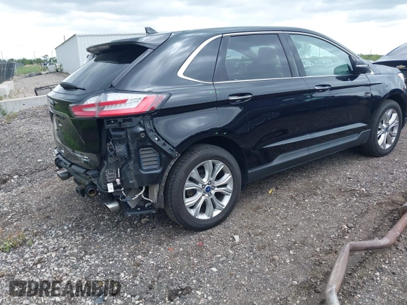 2020 Ford Edge Titanium with VIN 2FMPK4K94LBA22657, listed as a IAAI auction lot 42340706 with 62,857 mi miles and . Bid and sale history available at DreamBid. Image 4.