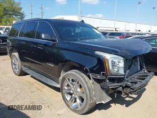 2017 GMC Yukon SLT z VIN 1GKS1BKCXHR270423, wystawiony jako IAAI lot #41864007 z przebiegiem 95 566 mil mil oraz . Historia ofert i sprzedaży dostępna na DreamBid. Obrazek 1.