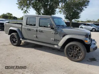 2023 Jeep Gladiator High Altitude with VIN 1C6HJTFG2PL545932, listed as a Copart auction lot 70679294 with 20,747 mi miles and Salvage title. Bid and sale history available at DreamBid. Image 4.