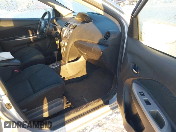 2010 Toyota Yaris with VIN JTDBT4K38A4076168, listed as a IAAI auction lot 41635379 with 156,016 mi miles. Bid and sale history available at carsss.com. Image 5.