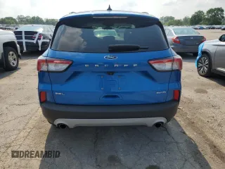 2021 Ford Escape SEL with VIN 1FMCU9H63MUA70536, listed as a Copart auction lot 59967975 with 79,389 mi miles and Salvage title. Bid and sale history available at DreamBid. Image 6.
