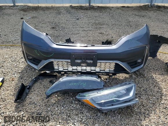 2020 Honda CR-V Touring with VIN 2HKRW2H99LH677964, listed as a Copart auction lot 61169915 with 65,915 mi miles and Salvage title. Bid and sale history available at DreamBid. Image 13.