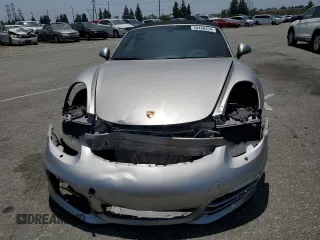 2013 Porsche Boxster z VIN WP0CA2A86DS113911, wystawiony jako Copart lot #58456454 z przebiegiem 101 149 mil mil oraz Szkoda całkowita • Salvage title. Historia ofert i sprzedaży dostępna na DreamBid. Obrazek 5.
