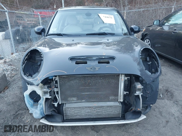 2016 MINI Cooper Hardtop 4 Door S with VIN WMWXU3C56G2B63682, listed as a IAAI auction lot 41244676 with 110,902 mi miles. Bid and sale history available at carsss.com. Image 13.