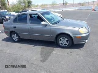 2003 Hyundai Accent GL with VIN KMHCG45C73U471607, listed as a IAAI auction lot 41956551 with 222,305 mi miles. Bid and sale history available at carsss.com. Image 13.