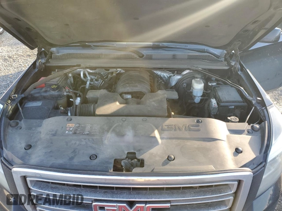 2015 GMC Yukon XL SLT with VIN 1GKS2HKC4FR697416, listed as a Copart auction lot 87887925 with 236,772 mi miles and Salvage Title. Bid and sale history available at carsss.com. Image 12.