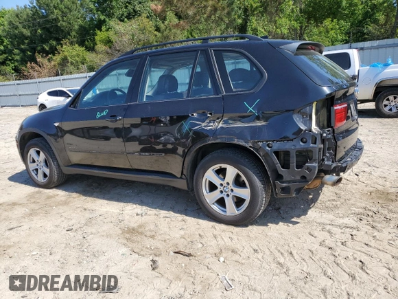 2012 BMW X5 35i z VIN 5UXZV4C52CL748838, wystawiony jako Copart lot #58051155 z przebiegiem 224 088 mil mil oraz Czysty tytuł • Clean title. Historia ofert i sprzedaży dostępna na DreamBid. Obrazek 2.