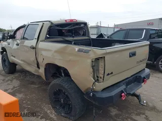 2017 Toyota Tundra 4WD SR5 with VIN 5TFDW5F16HX631528, listed as a IAAI auction lot 41829506 with 0 mi miles. Bid and sale history available at carsss.com. Image 3.