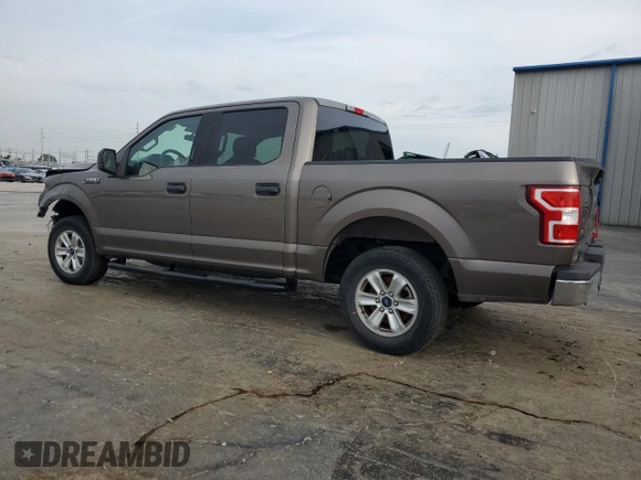 2020 Ford F-150 XL with VIN 1FTEW1C51LFA98104, listed as a Copart auction lot 68889294 with 82,183 mi miles and Salvage Title. Bid and sale history available at carsss.com. Image 2.