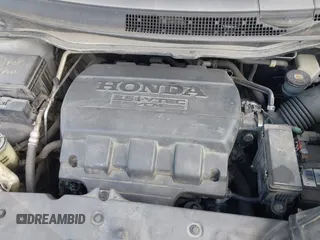 2012 Honda Odyssey EX-L with VIN 5FNRL5H63CB063815, listed as a IAAI auction lot 42302937 with 377,768 mi miles and . Bid and sale history available at DreamBid. Image 10.