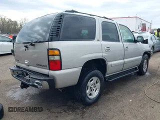 2004 Chevrolet Tahoe LS with VIN 1GNEK13ZX4J179560, listed as a IAAI auction lot 41998197 with 147,822 mi miles. Bid and sale history available at carsss.com. Image 4.