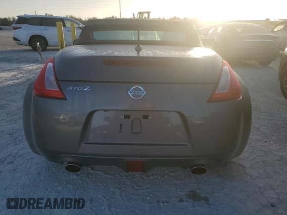 2014 Nissan 370Z Touring with VIN JN1AZ4FH4EM620092, listed as a Copart auction lot 77439254 with 38,662 mi miles and Salvage Title. Bid and sale history available at DreamBid. Image 6.