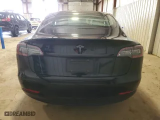 2022 Tesla Model 3 with VIN 5YJ3E1EA2NF336151, listed as a Copart auction lot 50795245 with 14,265 mi miles and Salvage Title. Bid and sale history available at carsss.com. Image 6.