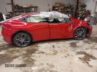 2024 Toyota Prius LE z VIN JTDADABU8R3013976, wystawiony jako IAAI lot #41621800 z przebiegiem 7475 mil mil oraz . Historia ofert i sprzedaży dostępna na DreamBid. Obrazek 13.