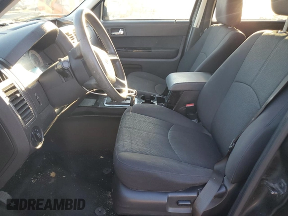 2011 Mazda Tribute Touring with VIN 4F2CY0C70BKM02624, listed as a Copart auction lot 75472464 with 172,077 mi miles and Salvage Title. Bid and sale history available at carsss.com. Image 7.