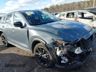 2022 Mazda CX-5 2.5 S Preferred Package with VIN JM3KFBCM1N0562277, listed as a IAAI auction lot 41421324 with 68,528 mi miles. Bid and sale history available at carsss.com. Image 6.