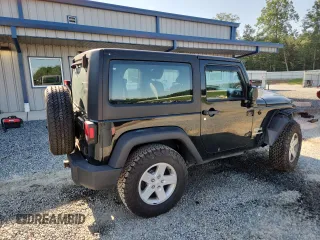 2012 Jeep Wrangler Sport with VIN 1C4AJWAG5CL273292, listed as a Copart auction lot 60135395 with 123,874 mi miles and Salvage title. Bid and sale history available at DreamBid. Image 3.