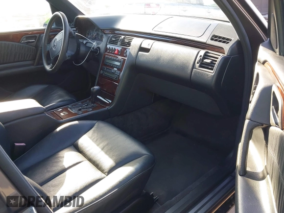 1997 Mercedes-Benz E 320 with VIN WDBJF55F7VA402305, listed as a IAAI auction lot 41865470 with 210,577 mi miles and . Bid and sale history available at DreamBid. Image 5.