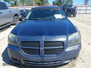 2006 Dodge Magnum with VIN 2D4FV47V46H179722, listed as a IAAI auction lot 41701629 with 215,162 mi miles. Bid and sale history available at carsss.com. Image 13.