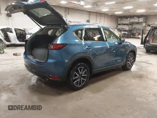 2018 Mazda CX-5 S Premium with VIN JM3KFBDMXJ1376045, listed as a IAAI auction lot 41813968 with 90,378 mi miles and . Bid and sale history available at DreamBid. Image 4.