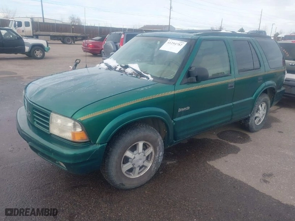 1999 Oldsmobile Bravada with VIN 1GHDT13W7X2711363, listed as a IAAI auction lot 41294782 with NaN miles. Bid and sale history available at carsss.com. Image 2.