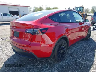 2022 Tesla Model Y Long Range with VIN 7SAYGDEE7NF549278, listed as a IAAI auction lot 42072801 with 39,374 mi miles and . Bid and sale history available at carsss.com. Image 4.