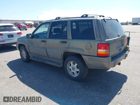 1996 Jeep Grand Cherokee Limited with VIN 1J4GZ78Y1TC162546, listed as a IAAI auction lot 42612646 with 204,098 mi miles and . Bid and sale history available at DreamBid. Image 3.