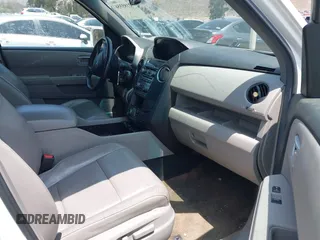 2013 Honda Pilot Touring with VIN 5FNYF3H93DB017954, listed as a IAAI auction lot 42185556 with 174,929 mi miles and . Bid and sale history available at carsss.com. Image 5.