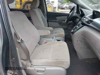 2012 Honda Odyssey EX z VIN 5FNRL5H45CB084342, wystawiony jako IAAI lot #42329303 z przebiegiem 173 711 mil mil oraz . Historia ofert i sprzedaży dostępna na DreamBid. Obrazek 5.